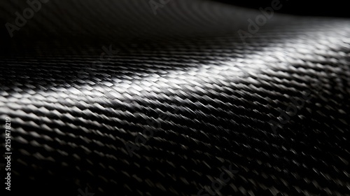 Polished carbon fiber surface macro detail