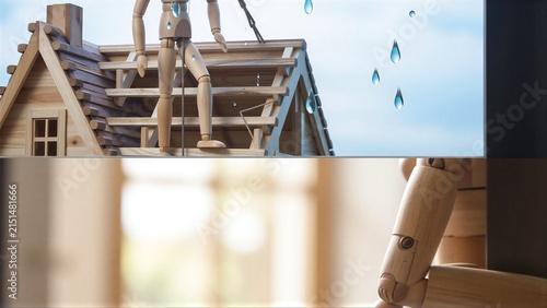Wooden figure stands on roof, water droplets fall from sky above.