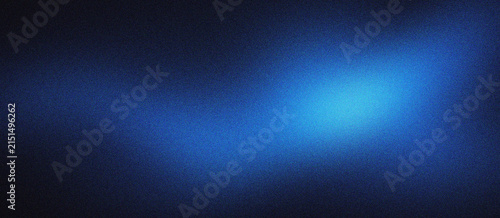 Abstract blue gradient background with grainy texture and soft light. Dark blue atmospheric backdrop for technology and cinematic design. Moody blue light leak on textured black surface art.