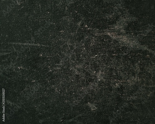 Abstract dark grunge texture with scratches and dust