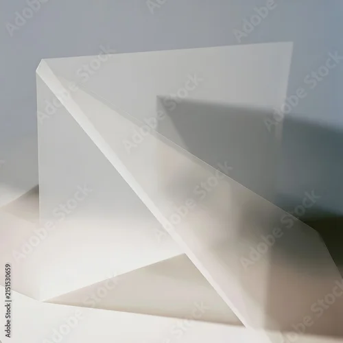 Fototapeta samoprzylepna Folded sheet of translucent vellum paper with geometric shadow