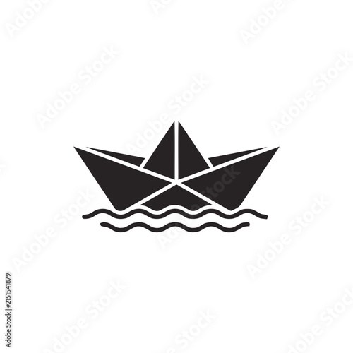 Black paper boat floating on wavy water, simple flat icon silhouette