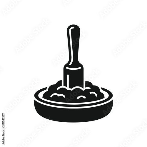 Simple illustration of mashed potatoes or porridge with a spoon in a bowl, black and white icon.