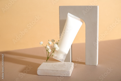 Composition with tube of co...