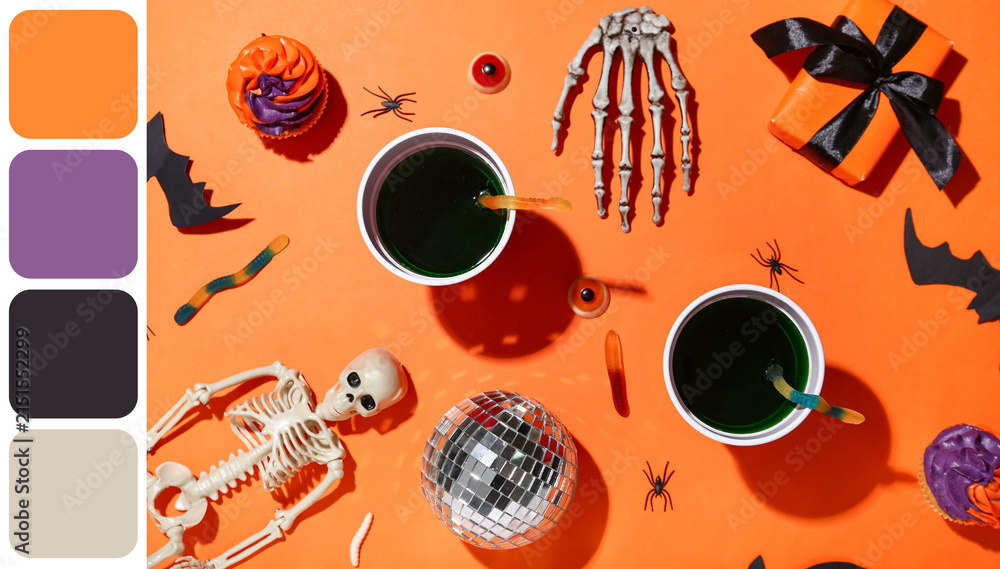 Fototapeta premium Halloween party flat lay with skeleton and treats