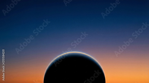 Sunrise horizon glowing with warm orange and cool blue hues
