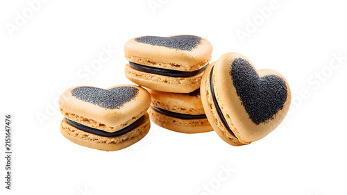 Heart shaped macarons with dark filling stack