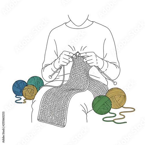 Person knitting with colorful yarn balls, hobby, craft, handmade textile, creative activity