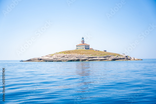Foto Porer Lighthouse on Porer Islet near Cape Kamenjak in Istria Croatia on the Adriatic Sea