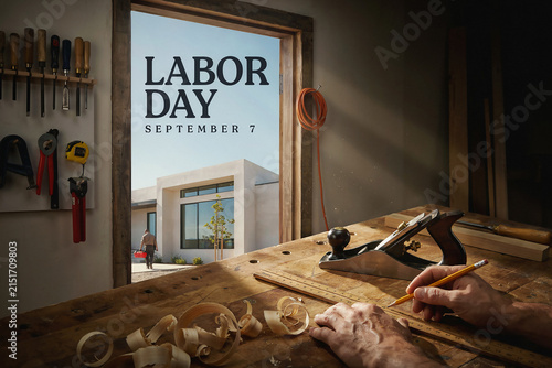 Labor Day September 7 announcement in woodworking shop. Carpenter hands working on wood bench. Rustic workshop interior with tools.