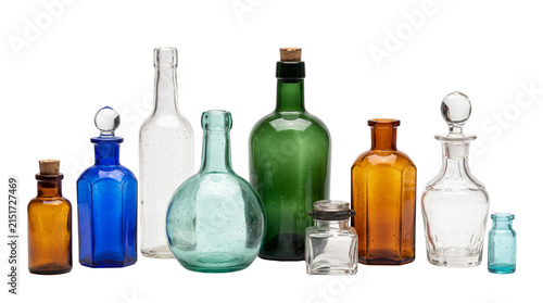 Collection of antique glass bottles in various shapes and colors.