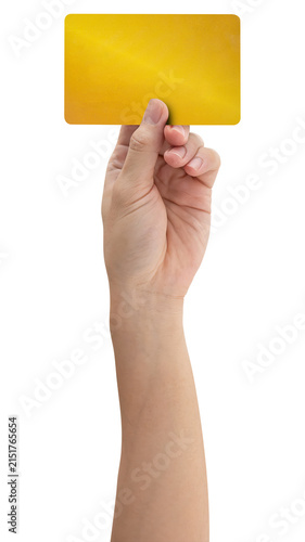 A close-up man hand holds a gold credit card isolated on white background with a clipping path.