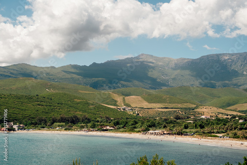 Constrast between mountains and beach with a breathtaking landscape