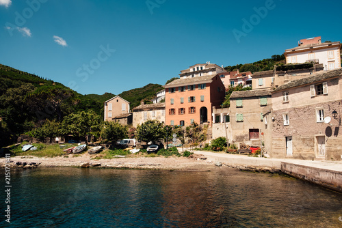 Small boats in a tiny coastal village along the Mediterranean sea