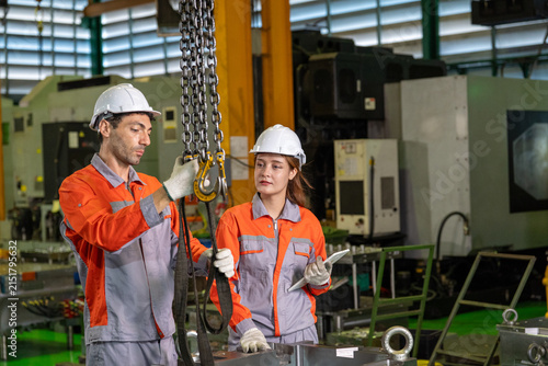 Принти на полотні Engineer factory worker helmet hoist chain machine, industrial team inspecting l