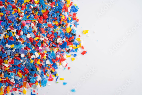 Картината върху платно Plastic colorful pieces recycling shredded for industrial use.