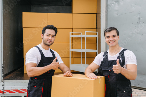Professional Movers Loading Boxes for Efficient Relocation Service