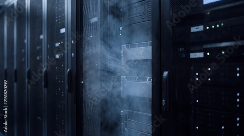 Принти на полотні Cool air flow from multiple server racks in a large, modern data center environment