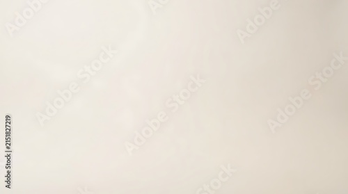 Seamless beige gradient studio backdrop for clean product photography and elegant portraits
