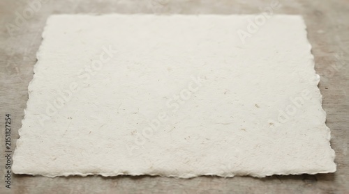 Handcrafted textured white paper sheet for art, craft, and elegant background design use