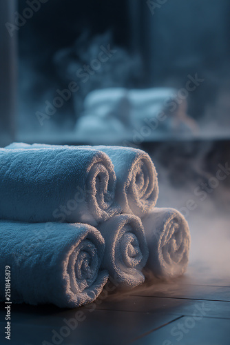 Steamy shelves rolled towels on it generated.AI