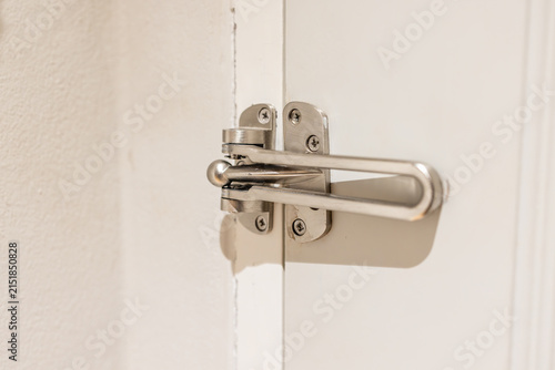 Obraz na płótnie Swing bar door guard (Hotel Latch) is close.