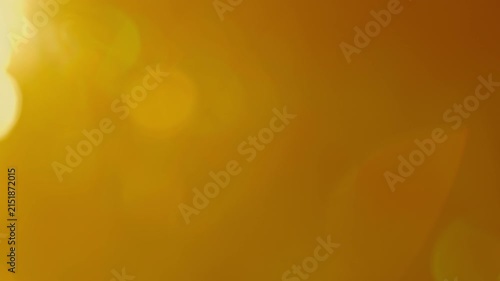 Deep copper sunset flare gleaming in evening breeze, moody abstract backdrop