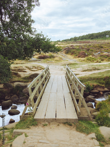 Canvas Print A view of the wooden footbridge at Padley Gorge, Peak District National Park, UK