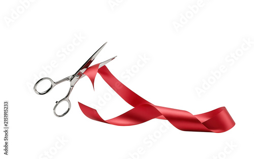 Scissors cutting a red ribbon isolated on transparent background