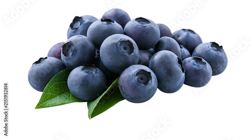 Heap of fresh blueberries with green leaves