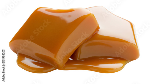 Konstfotografi Melted caramel candy squares dripping