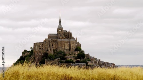 Mont Saint Michel at sunset in Normandie in France , Unesco World Heritage Site , 4k video footage