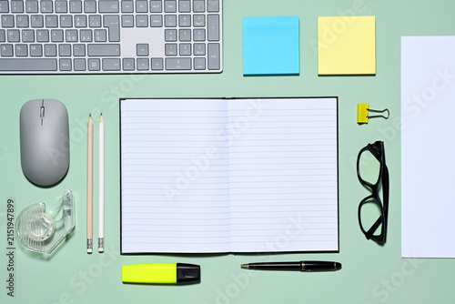 Office items on green background