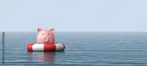 A pink piggy bank floats in a life preserver on the calm ocean