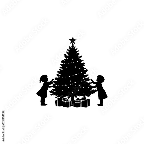 Two children decorating a christmas tree with wrapped gifts beneath, black and white silhouette holiday scene