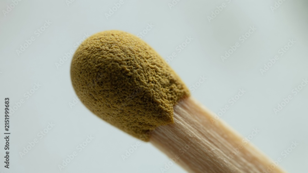 matchstick with mold on neutral background close-up natural everyday objects still life yellow brown commercial editorial educational visual story design resource web banner poster copysace.