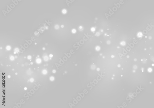 Soft glowing white bokeh light spots scattered on black background with subtle blurred halos on transparent background