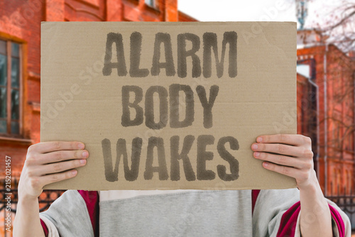 Obraz na płótnie "Alarm body wakes" The sound rouses your body, but your mind is still sleeping