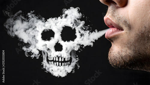 Macro close-up of a man exhaling white vapor that forms a detailed human skull against a solid black background. Conceptual image representing the lethal dangers of smoking and addiction.