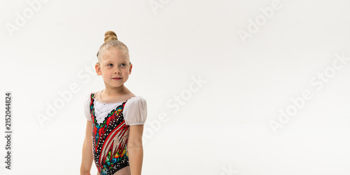 Portrait of child with cochlear implant during dance practice in studio. Banner with copy space. Hearing loss treatment, auditory rehabilitation, assistive medical device, emotional adaptation, and
