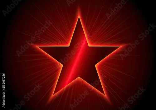 Radiant red star bursts with fiery light on dark background