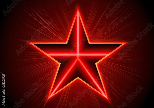 Glowing red star with radiating light bursts on a dark background