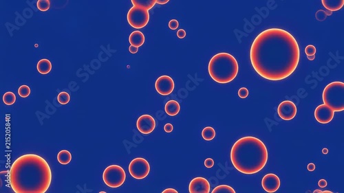 Abstract organic spheres gently floating in a dark blue fluid with warm glowing light