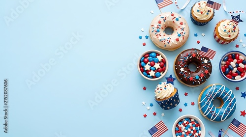 Assorted donuts decorated for fourth of july celebration with american flags on a light blue background