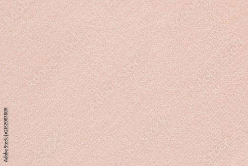 Soft pale pink fabric texture with subtle fuzzy surface