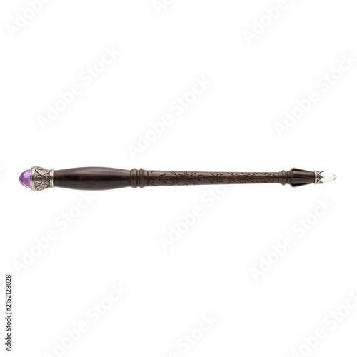 Фотография Ornate wooden magic wand with amethyst and crystal on isolated white background