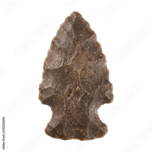 Obraz na płótnie Ancient stone arrowhead artifact with chipped edges on a clean white background