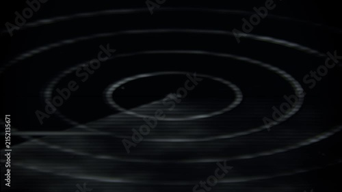 Rotating triangle sweep appearing on radar screen for scanning pinging rings blip specks amid noise
