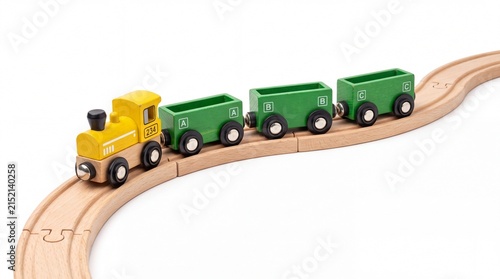 Bright wooden toy train engine with green cargo cars traveling along curved tracks on white background