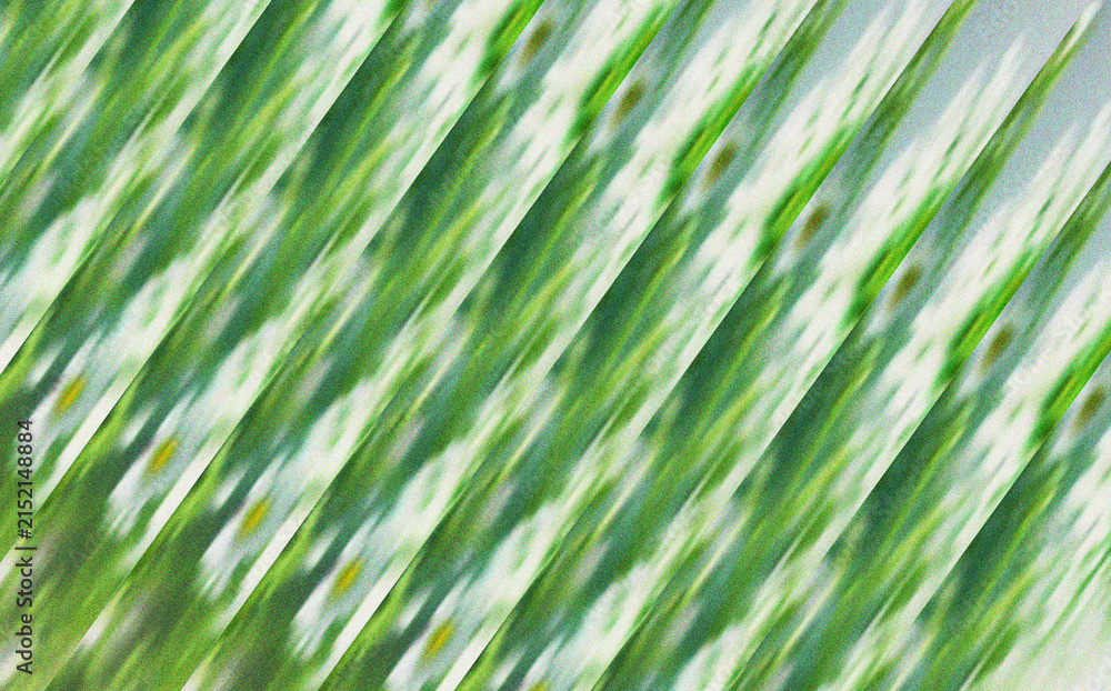 Fototapeta premium Lush green and white abstract diagonal pattern with a soft textured blur resembling natural plant elements and organic growth